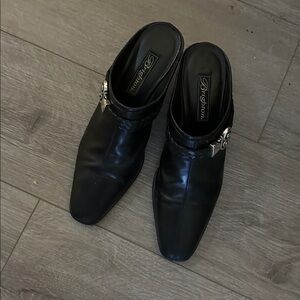 Brighton “twist” mules